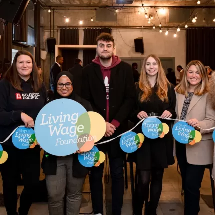 Tate and Lyle workers with living wage logo