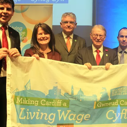 Cardiff LW City group of people with banner