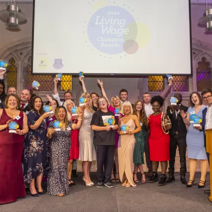 Group photo of Champion Awards 2022 winners on stage