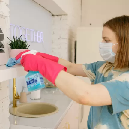 Cleaner cleaning surfaces around a sink