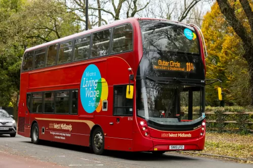 Living Wage logo on national express bus